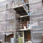 Smeersystemen op een bouwlift - verleng levensduur lift - De Jong's Liften
